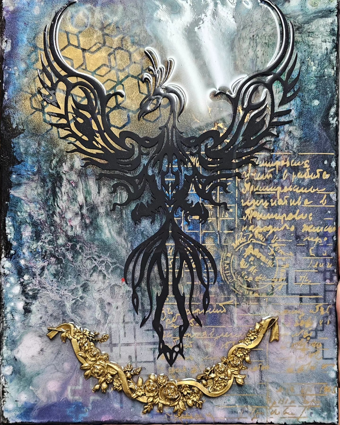 Ornamental bird stencil over textured painted layers with gold molded details