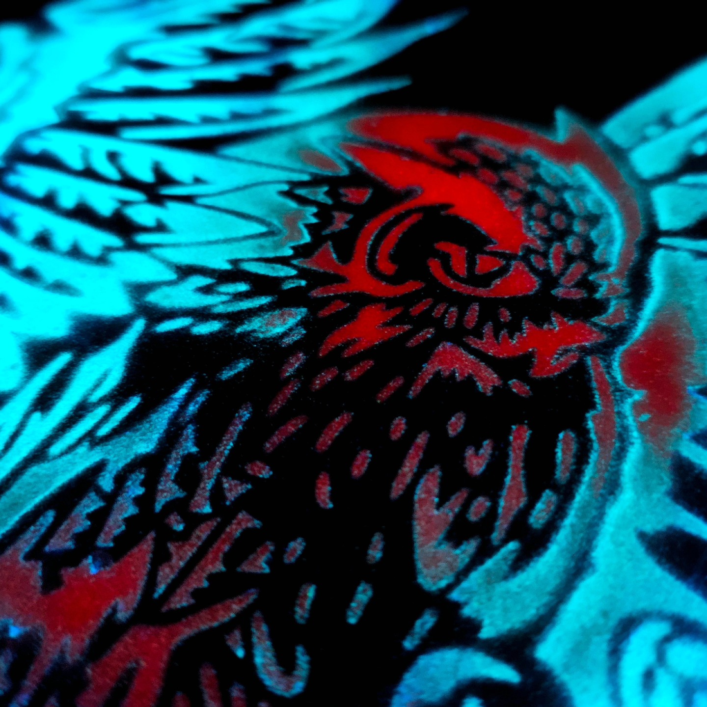 Owl artwork close-up under UV light
